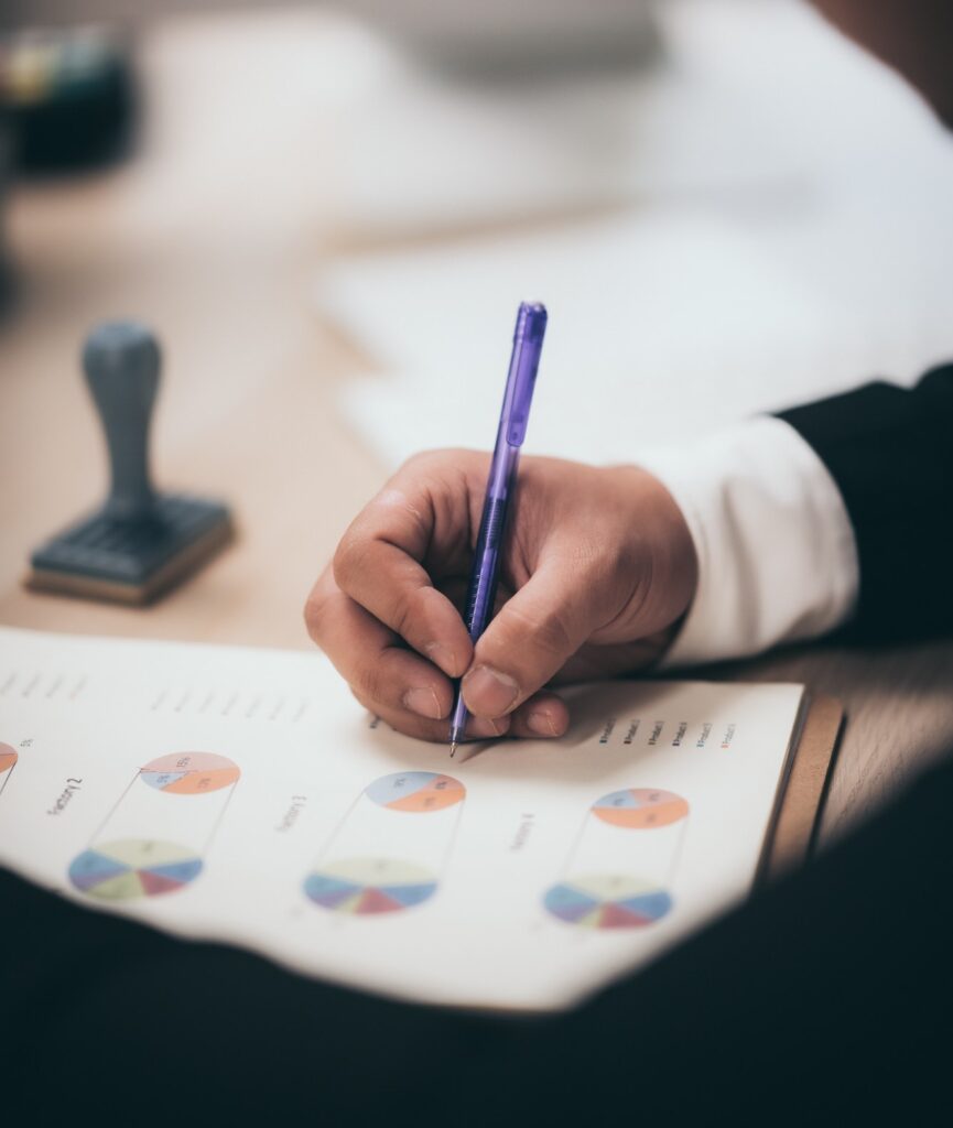 Business people are checking marketing documents